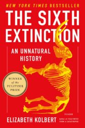 A yellow skeleton of (I think) a mastodon rotated so it's tusk-up, feet facing the left of the page, superimposed on a red background