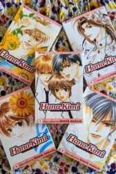 An arrangement of volumes one through five of the Japanese manga "Hana Kimi" by Hisaya Nakajo.