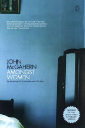 photograph of a blue wall with a fragment of a bed and a mirror in the frame.