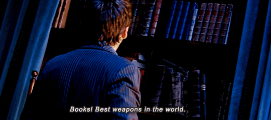 David Tennant as the Tenth Dr Who turning in front of a shelf of books, putting on glasses and saying “Books! Best weapons in the world.”