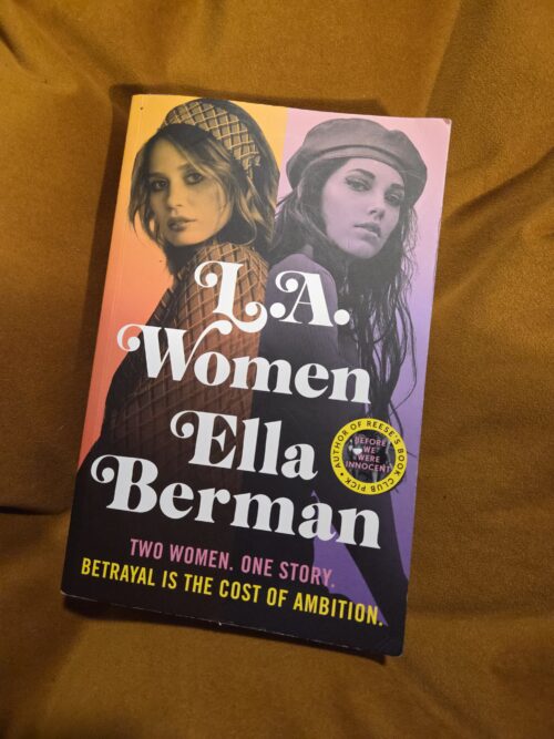 Cover of LA Women--two women, one Bohemian and one preppy, on an orange and purple background