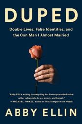 Cover of Duped. A person's hand is shown holding a pink rose.