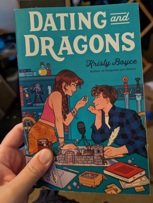 The cover of the book, "Dating and Dragons" by Kristy Boyce