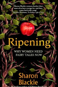 Ripening: Why Women Need Fairy Tales Now; book cover is black with a decorative tree motif around the edges, and a bright red apple hanging over the title.