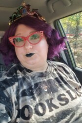 RevGirlUtena fabulous reader with purple hair and red glasses